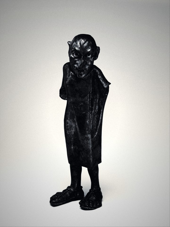 Grotesque figure, bronze, 2nd c. BCE.